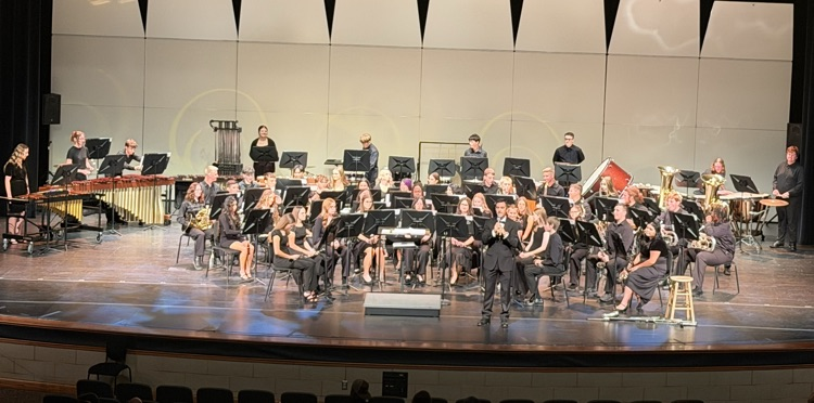 band director introducing the performance