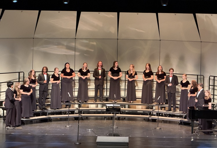 choir students singing on stage