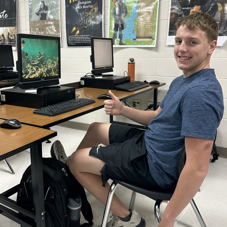 student playing computer game