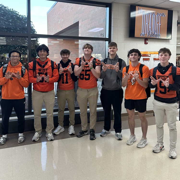 students wearing orange spirit wear