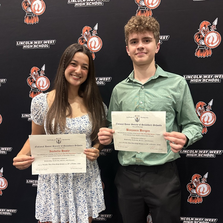 students posing with NHS certificates