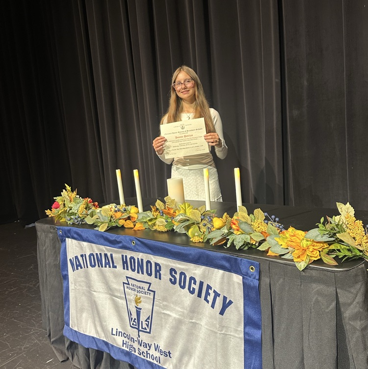 student at the NHS table