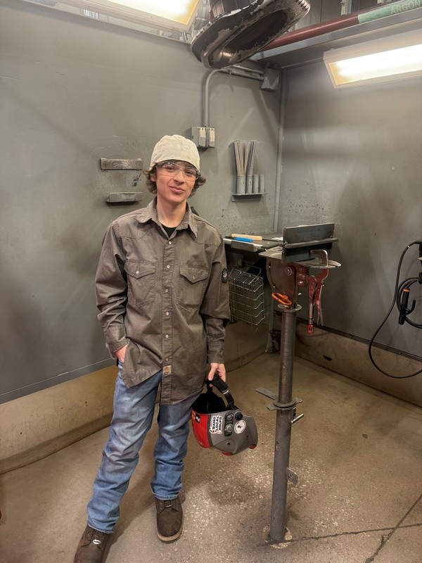 Welding student at contest