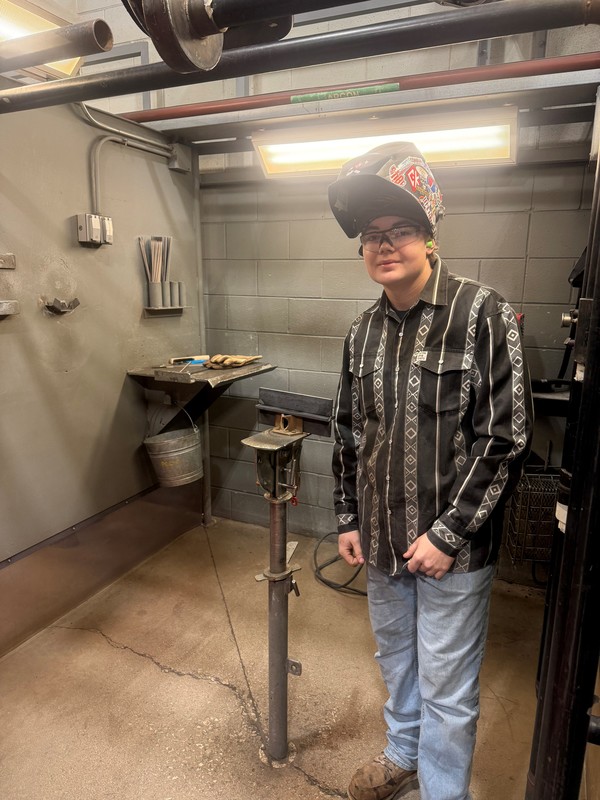 Welding student at contest