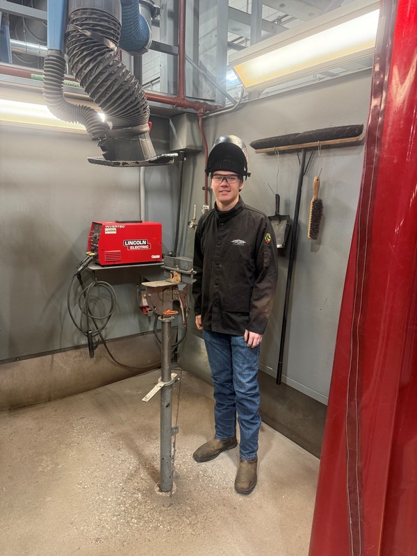 Welding student at contest