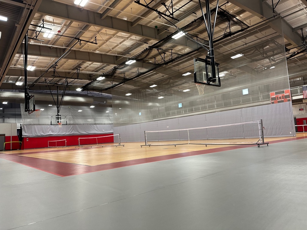 photo of empty gym set up for pickleball