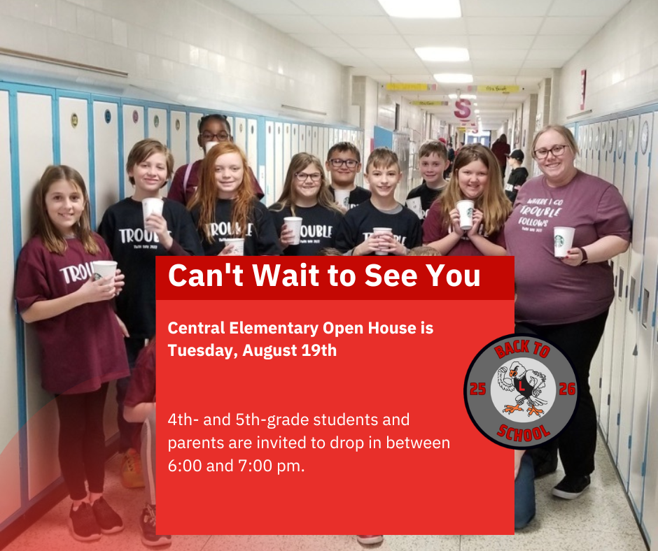 Students holding cups and standing with their teacher in the hallway