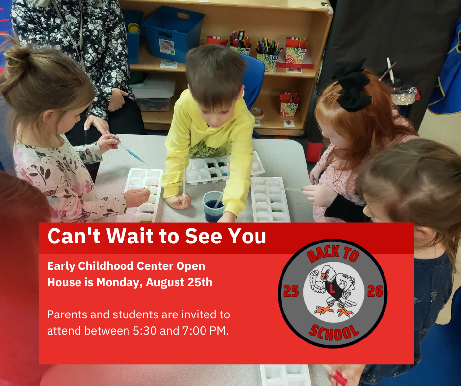 Preschool students at a table painting with water paints.