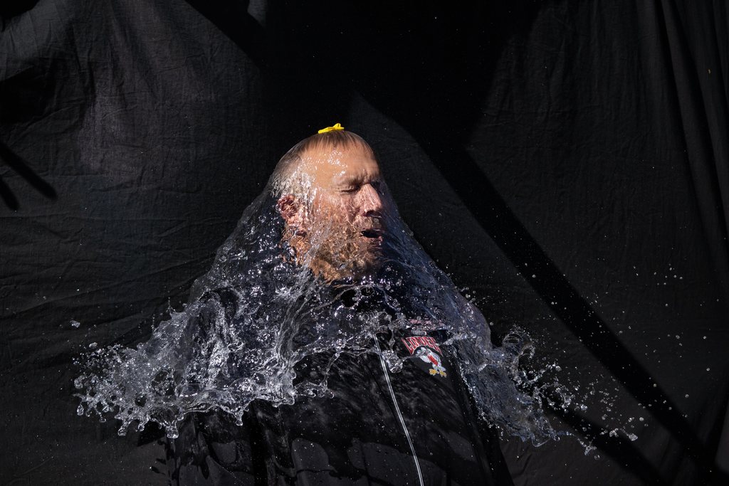 water balloon pop over person head