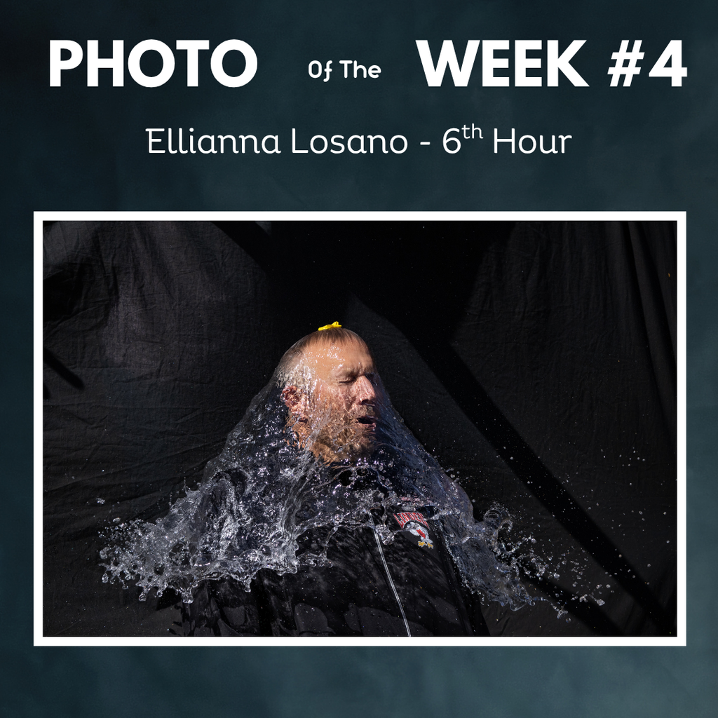 Waterballoon popping over persons head with splash by Ellianna Losano