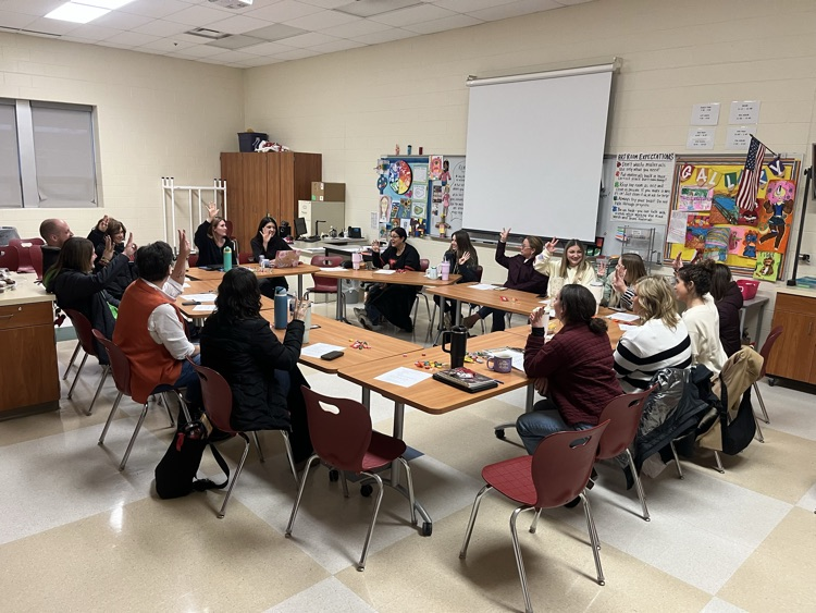 adults sitting at tables