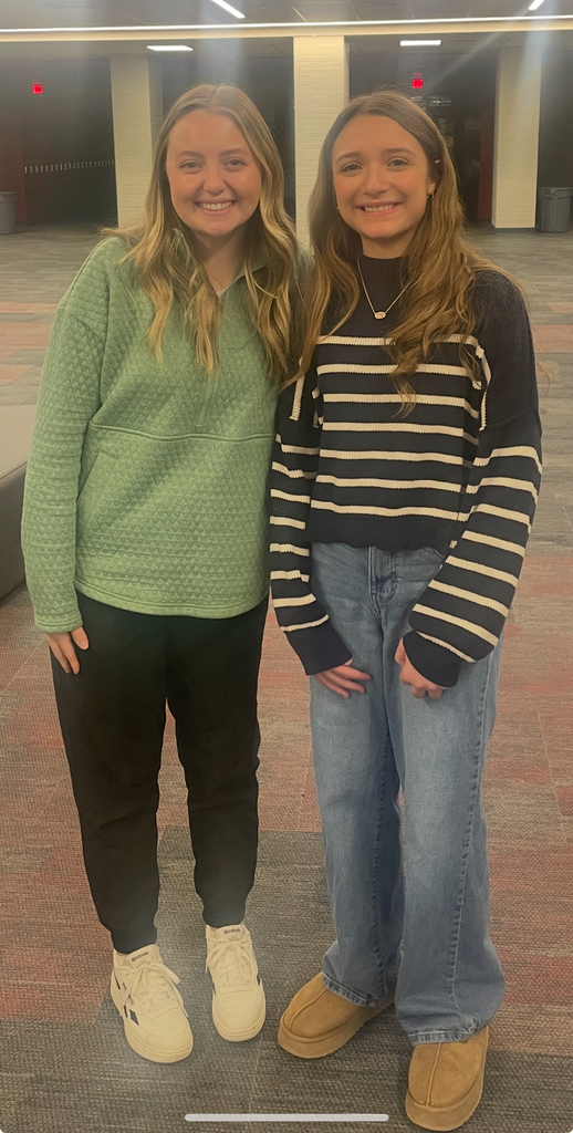 female teacher with female student