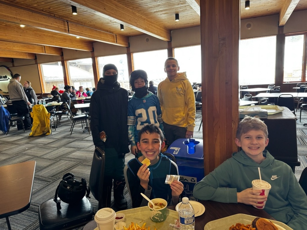 Middle School Students enjoying their lunch at Nub's Nob for the school ski Trip.