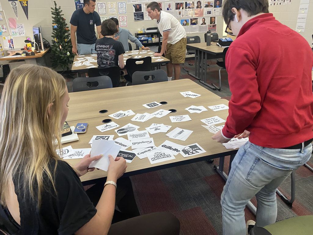 Students in Mrs. Parkin's Entrepreneurship class compete to see who can correctly match the most logo0s and slogans in the least amount of time.