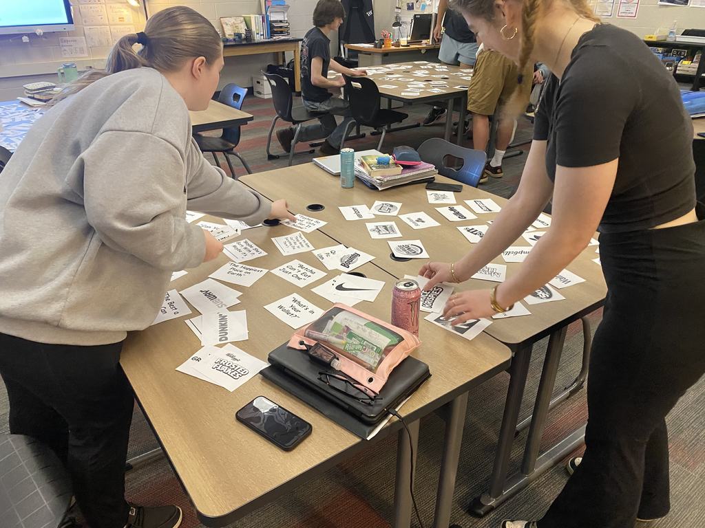 Students in Mrs. Parkin's Entrepreneurship class compete to see who can correctly match the most logo0s and slogans in the least amount of time.