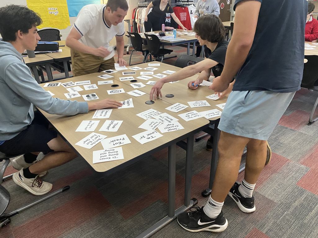 Students in Mrs. Parkin's Entrepreneurship class compete to see who can correctly match the most logo0s and slogans in the least amount of time.