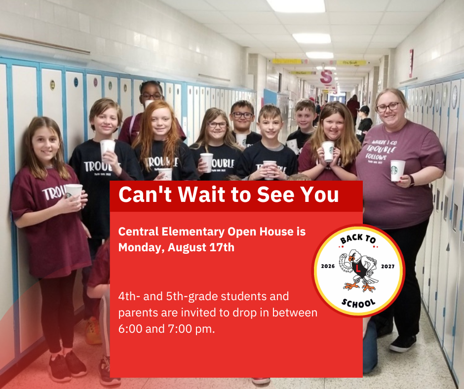 Teacher and students standing in the hallway holding paper Starbucks cups
