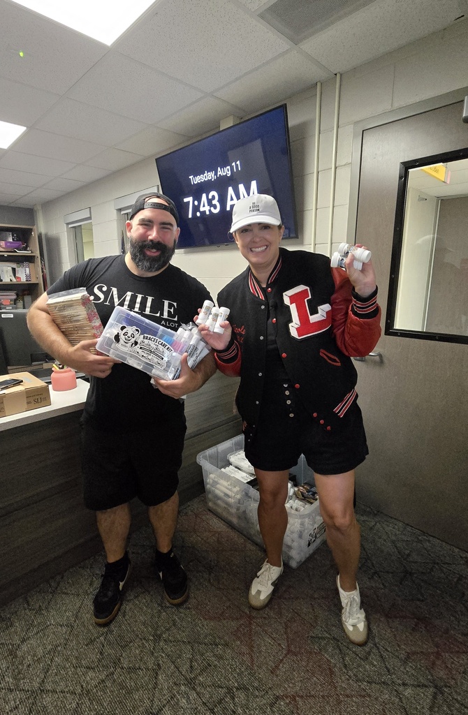 Dr. Wax donating school supplies and supporting our Linden Eagles. 