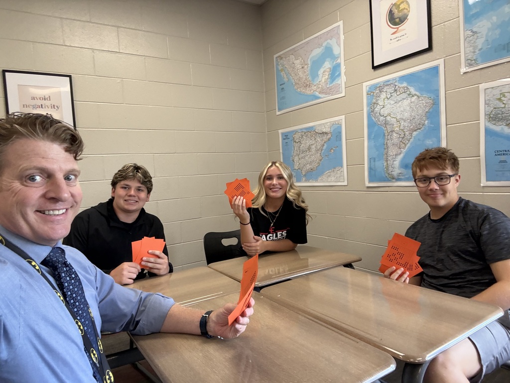 Co-principal and students using Geometry cards