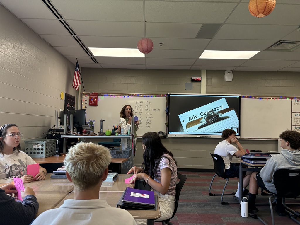 Ms. Campbell teaching her geometry kids how to communicate in math
