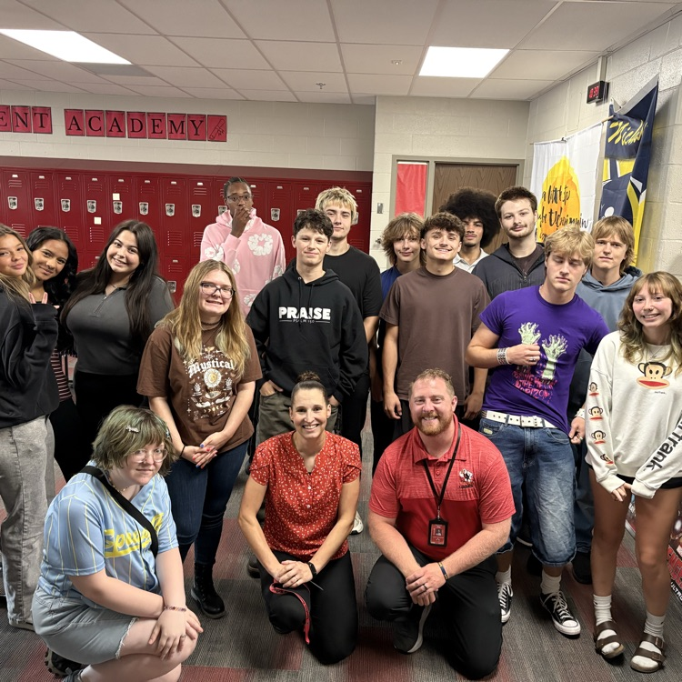 teachers and students posing for a picture