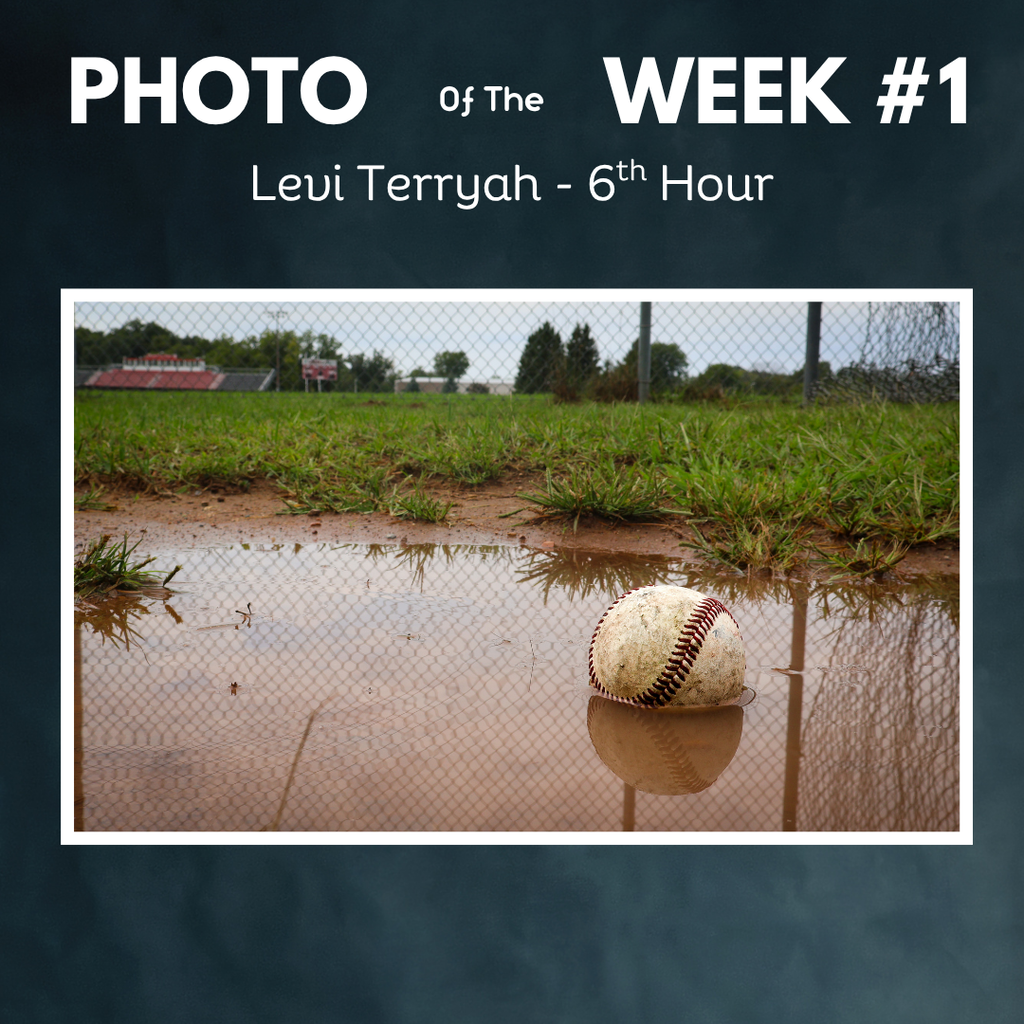 A graphic titled "Photo of the Week #1" featuring a photo by student Levi Terryah of a baseball resting in a rain puddle on a sports field, reflecting the ball in the water.