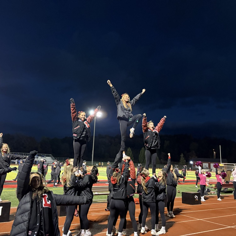 cheer team on sidelines at game