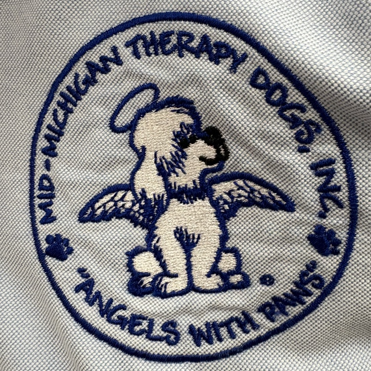 logo for mid Michigan therapy dogs on a patch