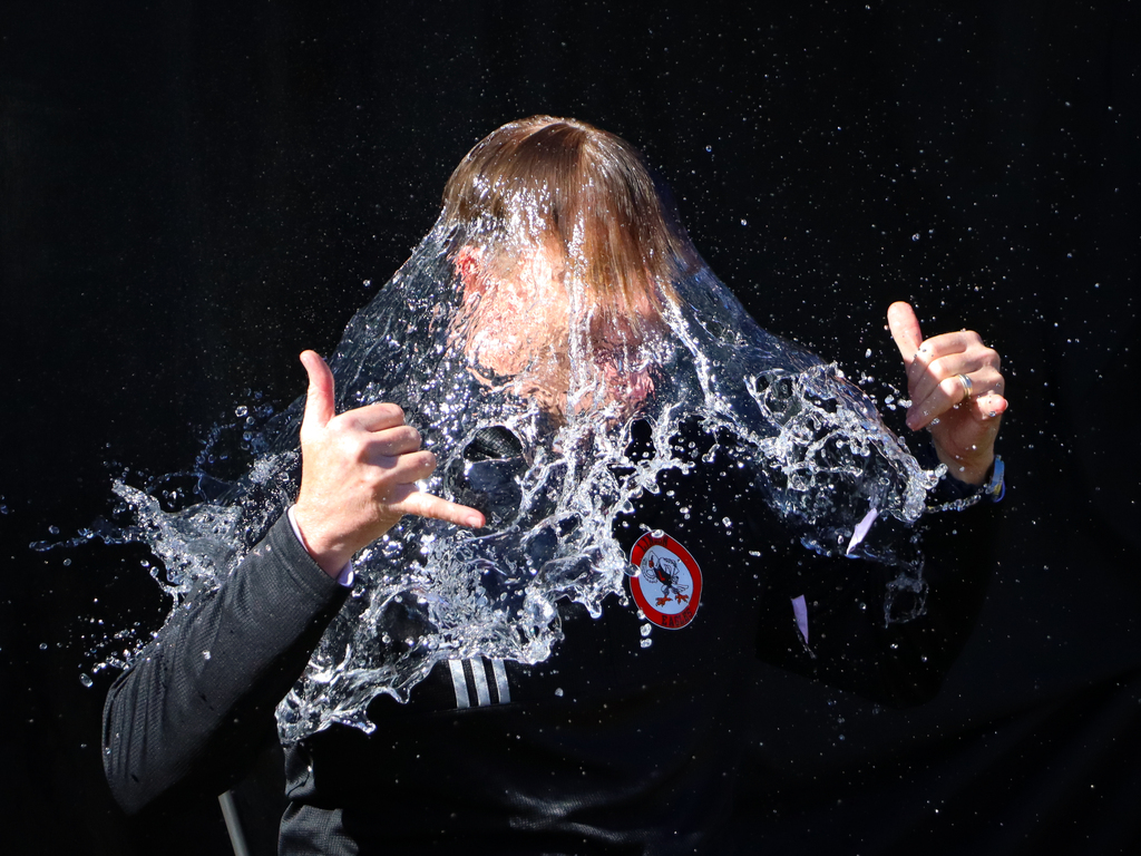 Person with water cascading over them