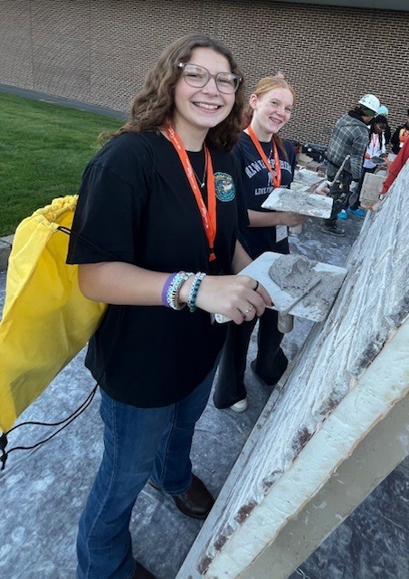Students learning about masonry work 