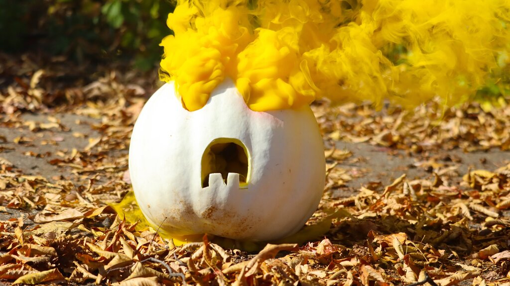 white pumpkin with yellow smoke