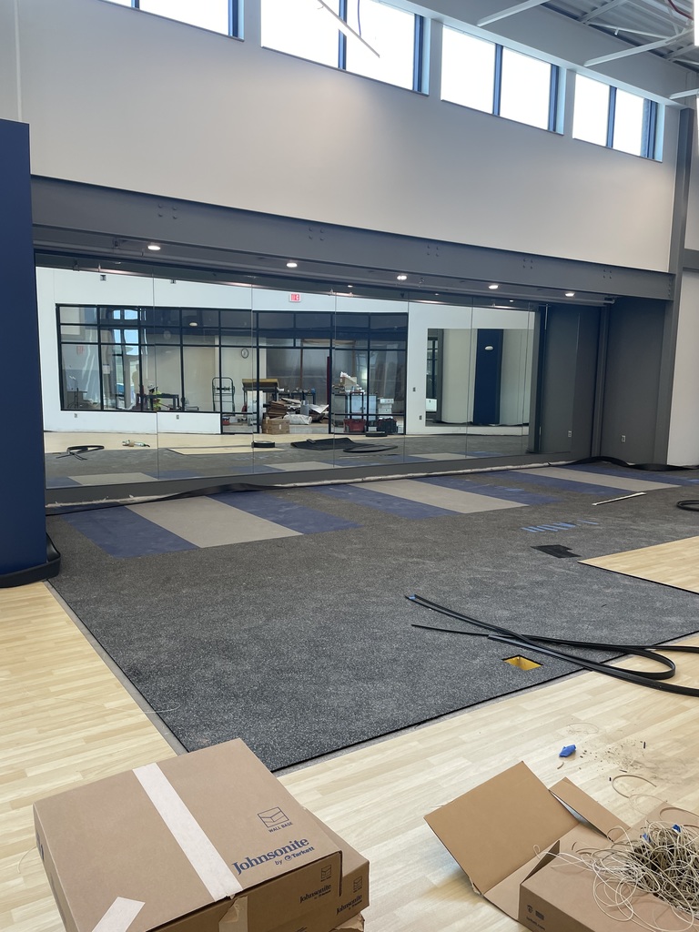 Fitness Center Flooring and mirrors.