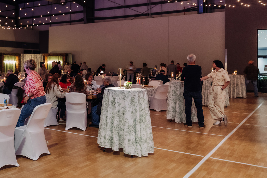 Guests enjoying sips and samples at The Grand Reveal.