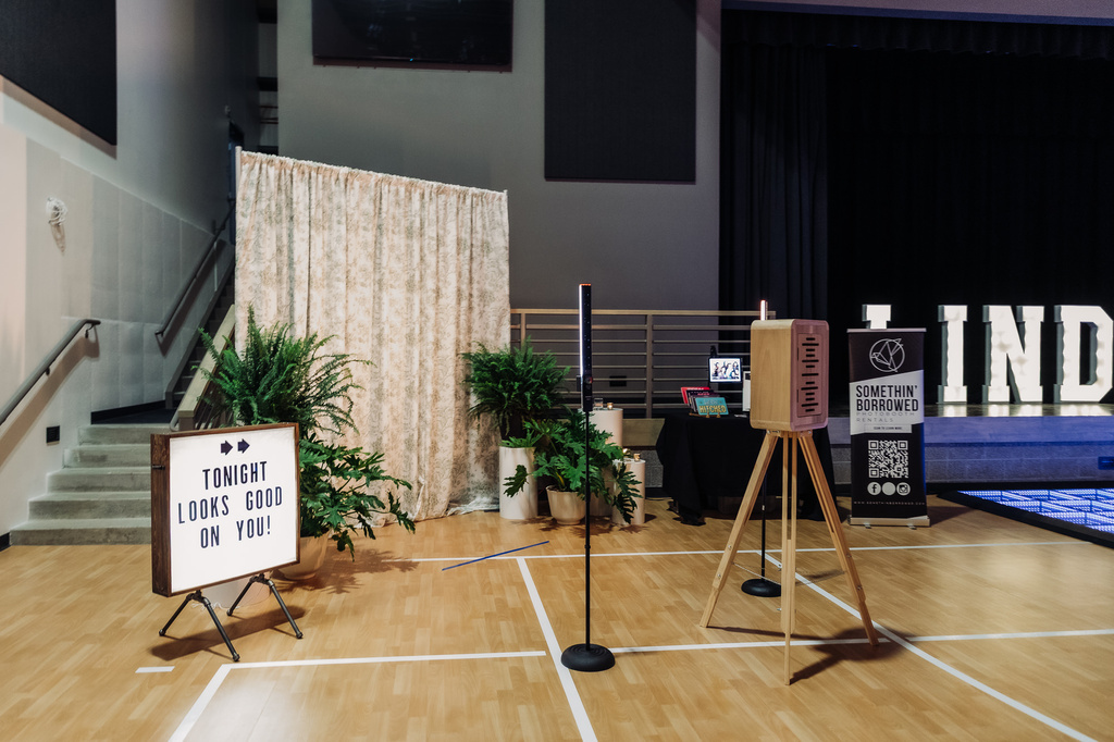 Photo booth provided by Somethin Borrowed Ltd and backdrop provided by Weathered Willow Events at The Grand Reveal.