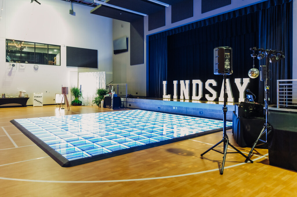 LED Dance Floor provided by SDM DJ Entertainment and Marquee Letters provided by Yeager Woods LLC at The Grand Reveal.