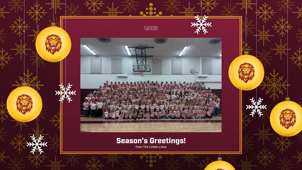 A holiday-themed graphic with a maroon and gold background decorated with snowflakes and hanging ornaments featuring the Lions logo. In the center is a large group photo of Linton Lions students and staff gathered in a school gymnasium, many wearing pink shirts. Above the photo is the word “Lions,” and below it reads “Season’s Greetings! from The Linton Lions.”