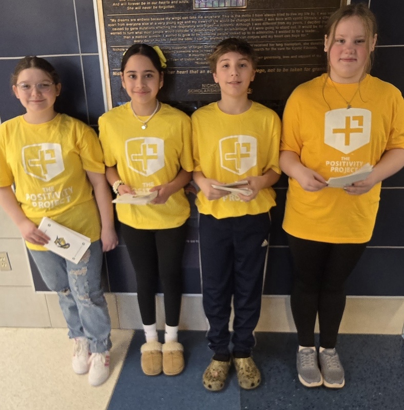 Students posing with their awards