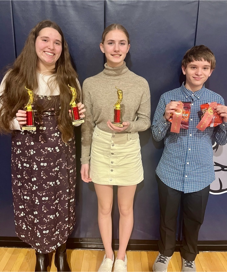 three speech students with awards
