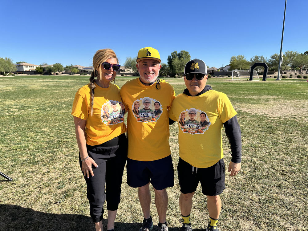 Principal Willis, Coach Wall, and Mr. Holzemer at the Mabel Marathon