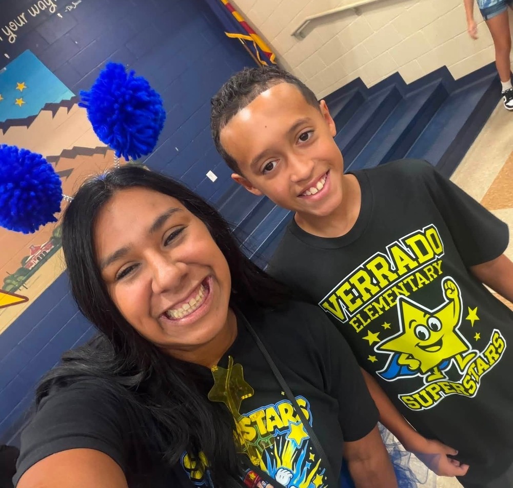 Smiling teacher and student