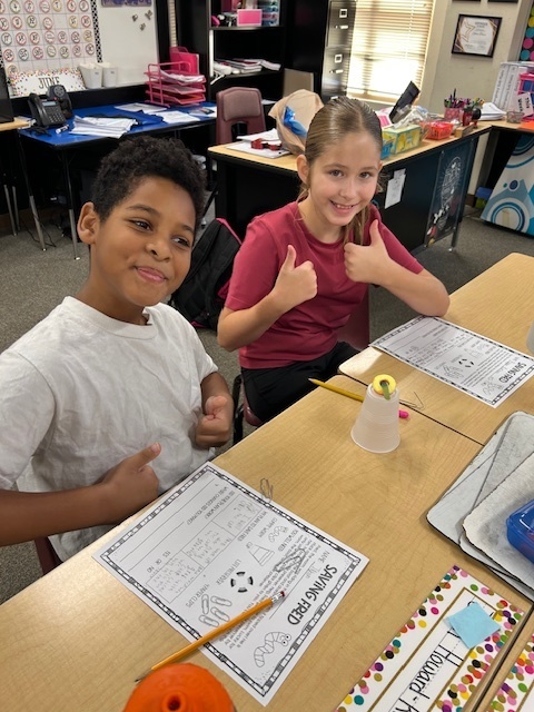 Fifth Grade Students working to Save Fred the gummy worm.