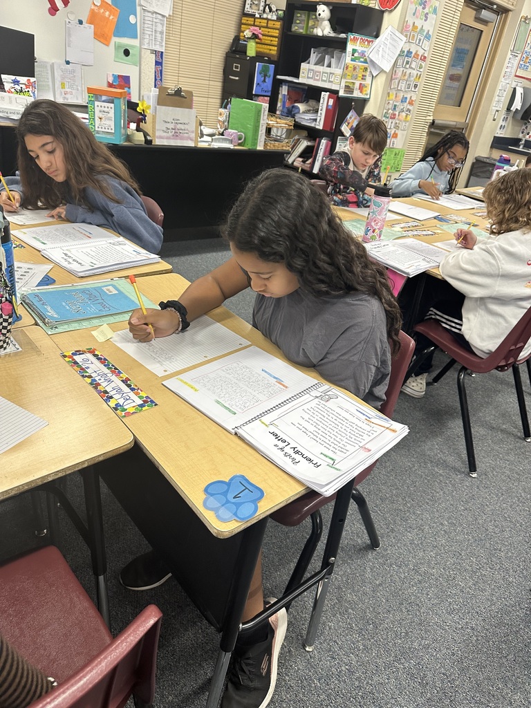 Students writing to pen pals in North Dakota