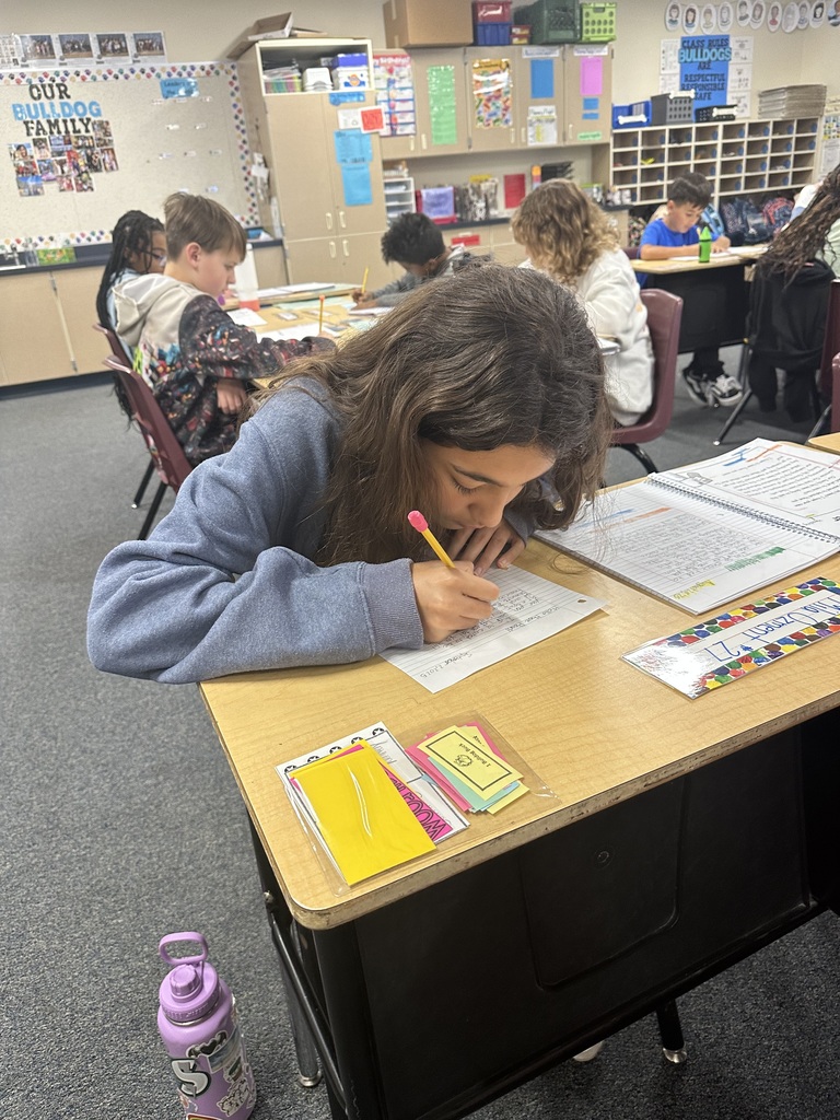 Students writing to pen pals in North Dakota