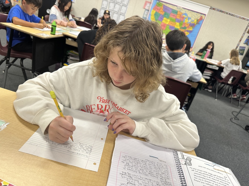 Students writing to pen pals in North Dakota