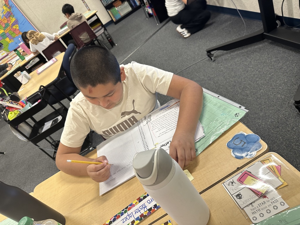Students writing to pen pals in North Dakota