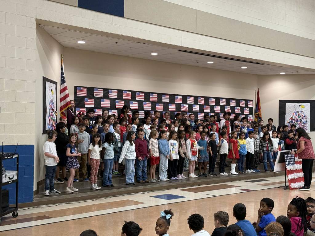 Third Grade students preforming during veteran's day assembly