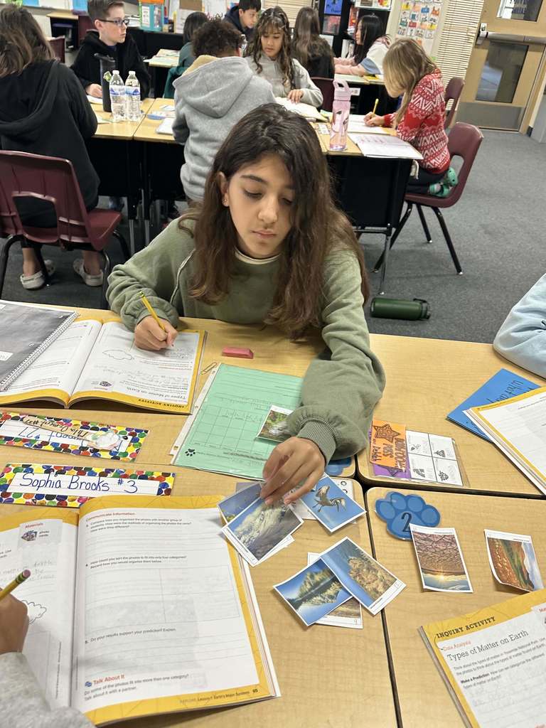 Student in classroom working on Science