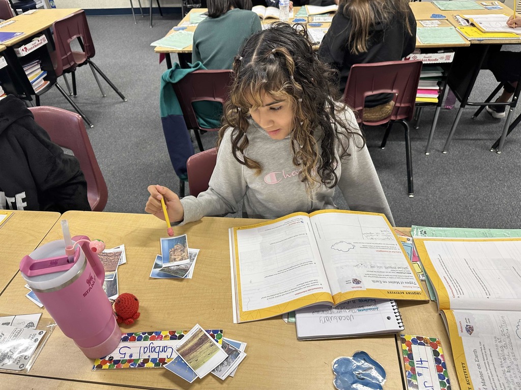 Students in classroom working on Science