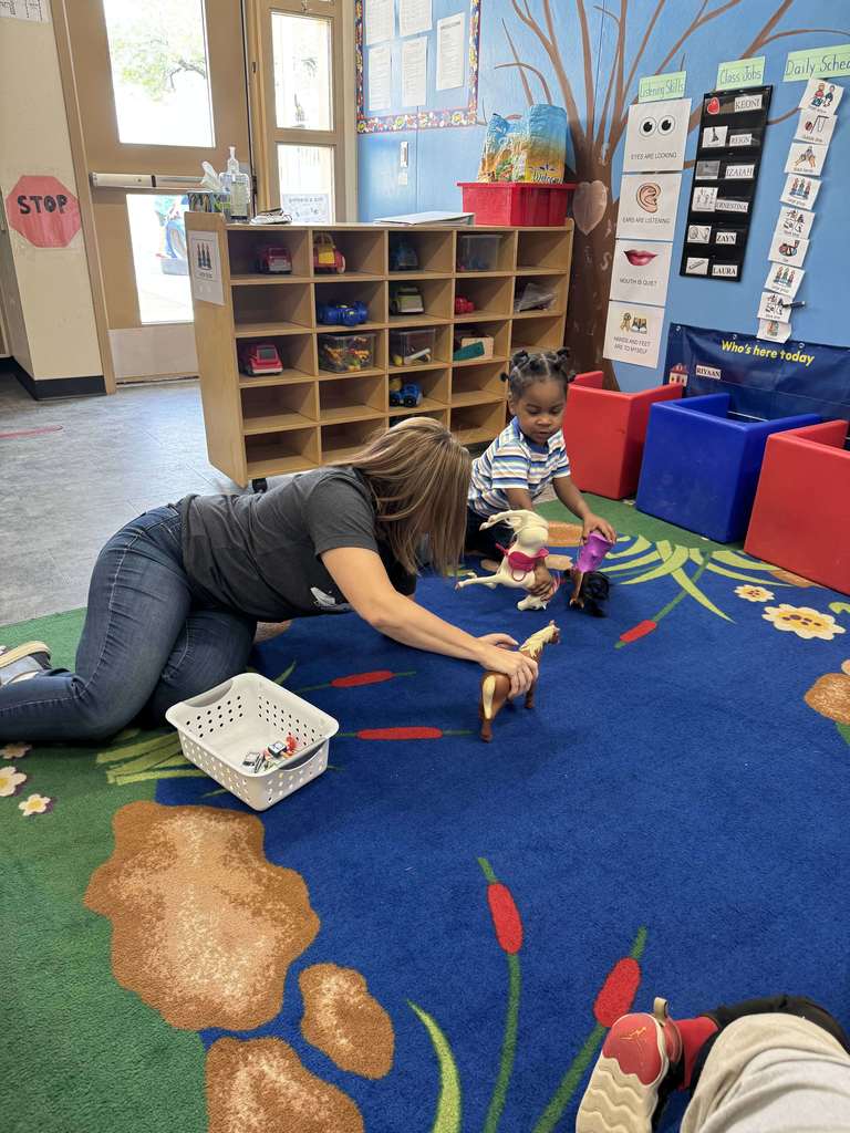 Mrs.Hill with our Preschool learners