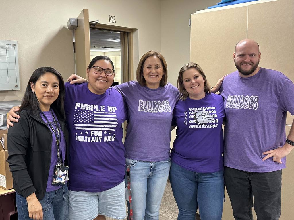 Fifth grade wearing purple